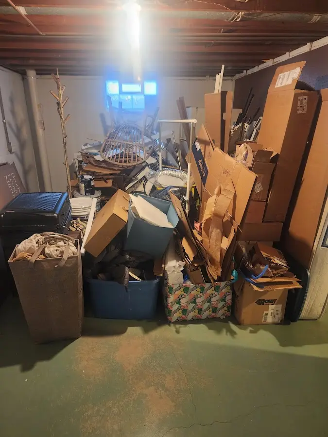 Roll-off dumpster container at job site for 4 Yard Dumpster Rental in Ashland